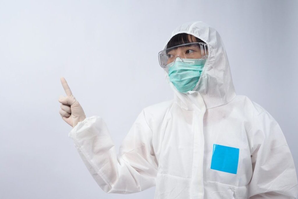 healthcare professional in PPE suit or personal protection equipment