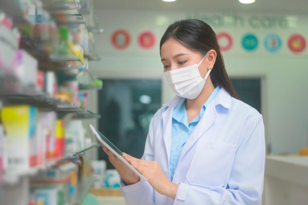 pharmacy technician working at a pharmacy store