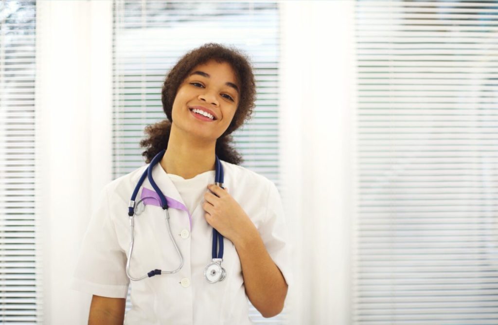 A nurse is happy at first day of duty after passing all nursing job interview questions