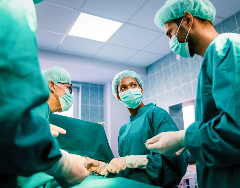 medical assistant helping in surgery room