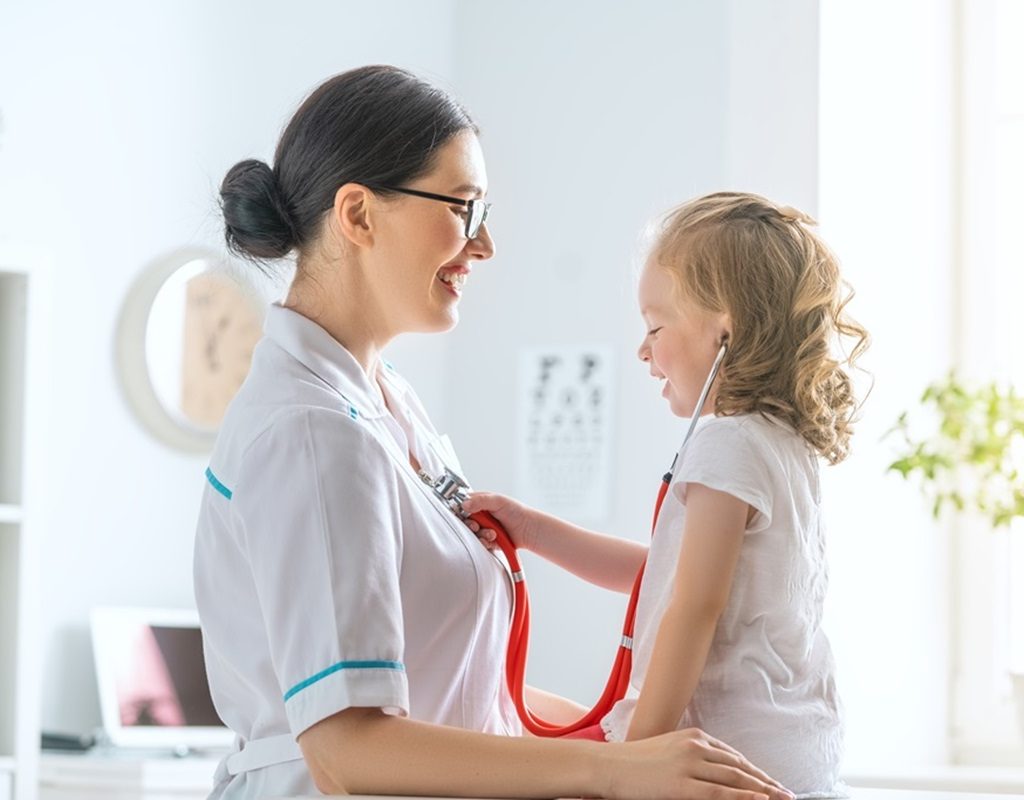 nurse assistant technique in examining a child