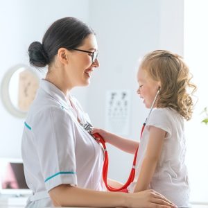 nurse assistant technique in examining a child