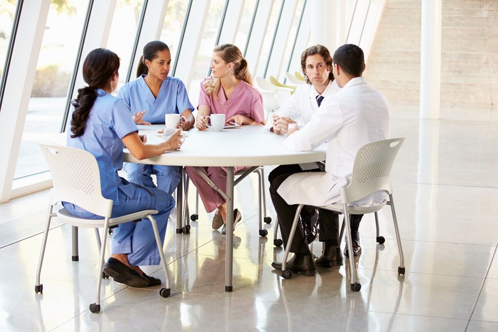 nurses with different specializations in a meeting