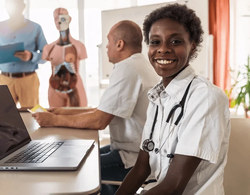 physician assistant performing data entry of patient information