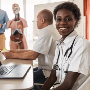 physician assistant performing data entry of patient information