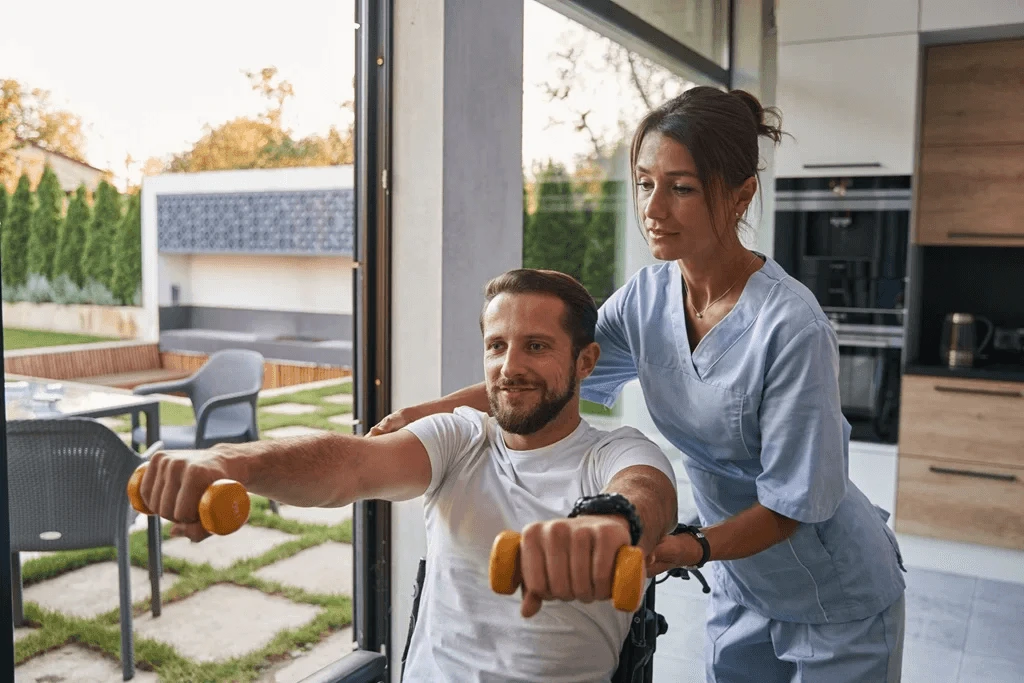 physical therapist assisting a patient