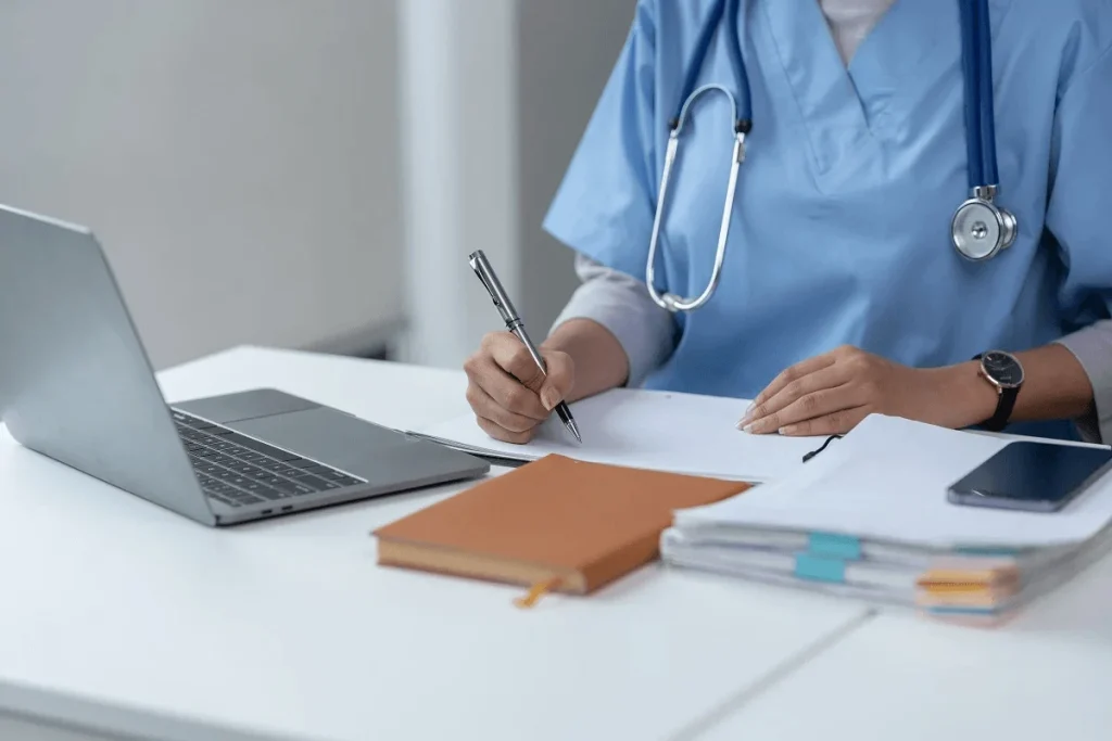 healthcare worker optimizing her medical coder resume