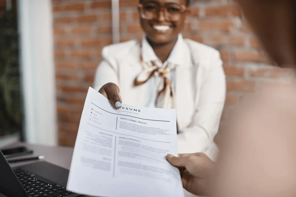 applicant presenting her resume introduction to the employer