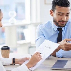 hiring manager reviewing resume header