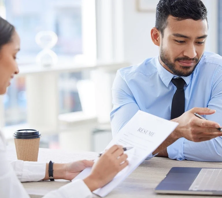 hiring manager reviewing resume header