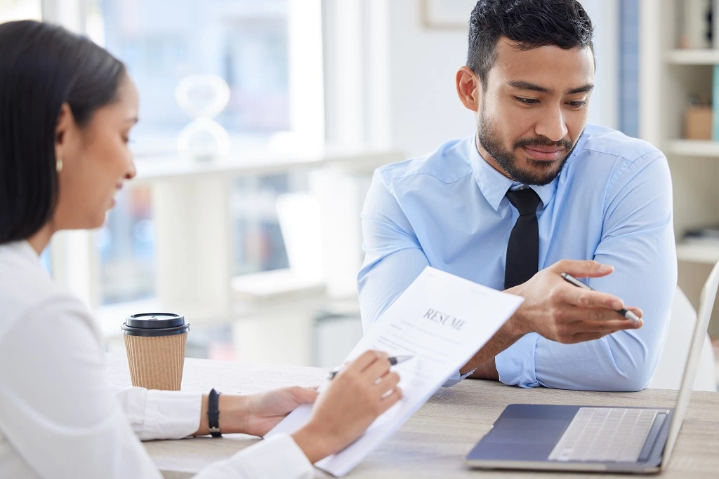 hiring manager reviewing resume header