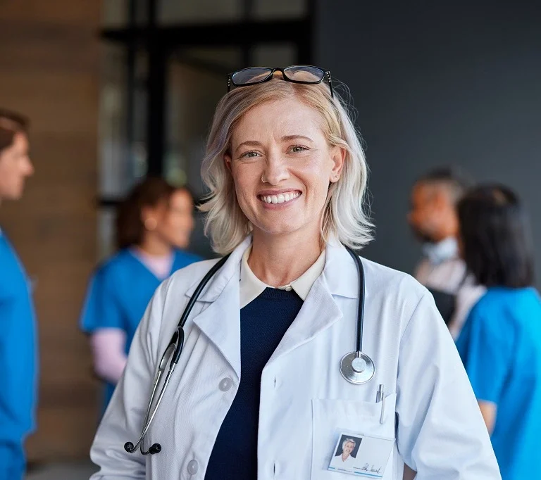 nurse practitioner in a hospital setting ready to answer nurse practitioner interview questions