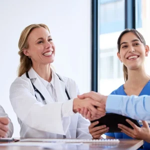 successful medical team meeting, reflecting key resume accomplishments