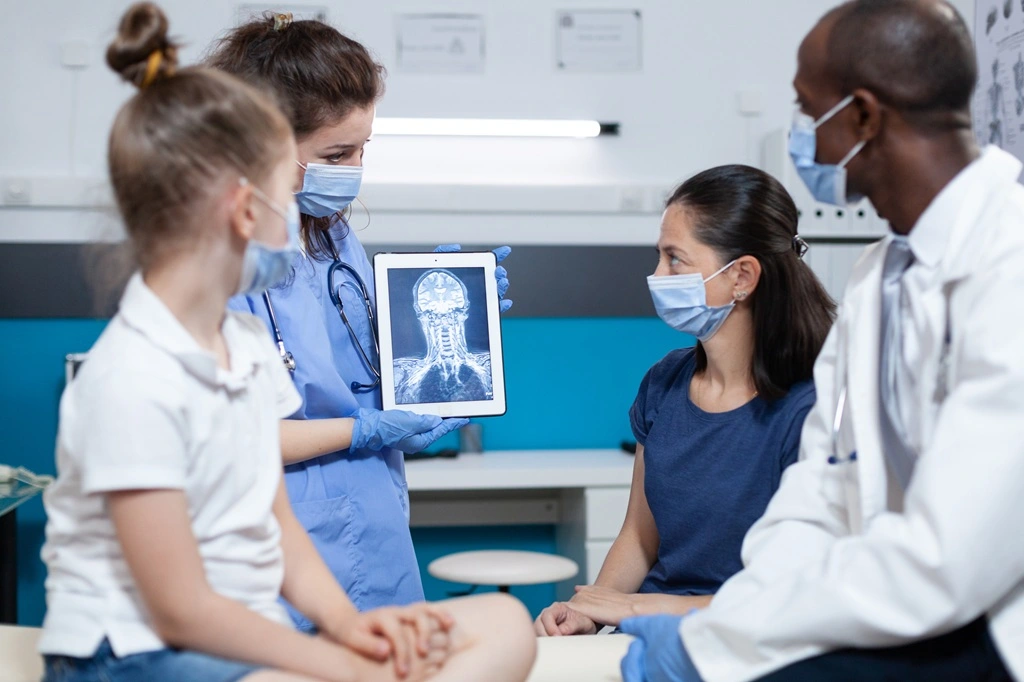 a doctor communicating with a patient during a consultation