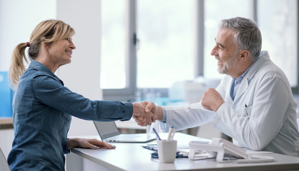 doctor and patient shaking hands 2025 01 08 14 15 57 utc 1