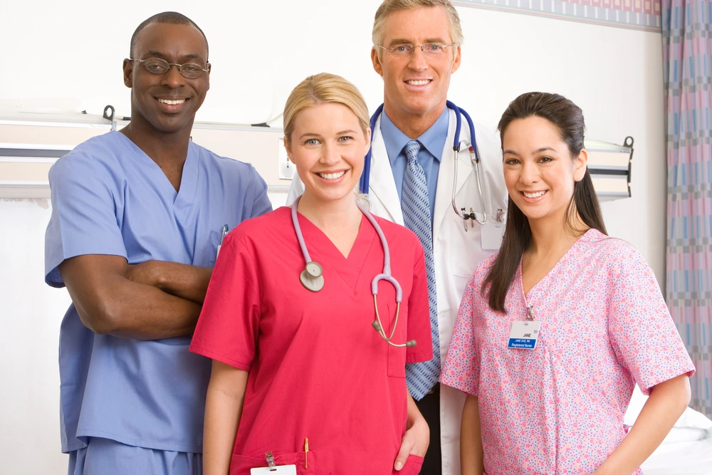 a team of physicians, nurses, pharmacists, therapists