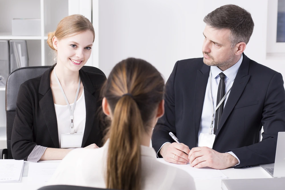 a panel of recruiters shooting various types of interview questions