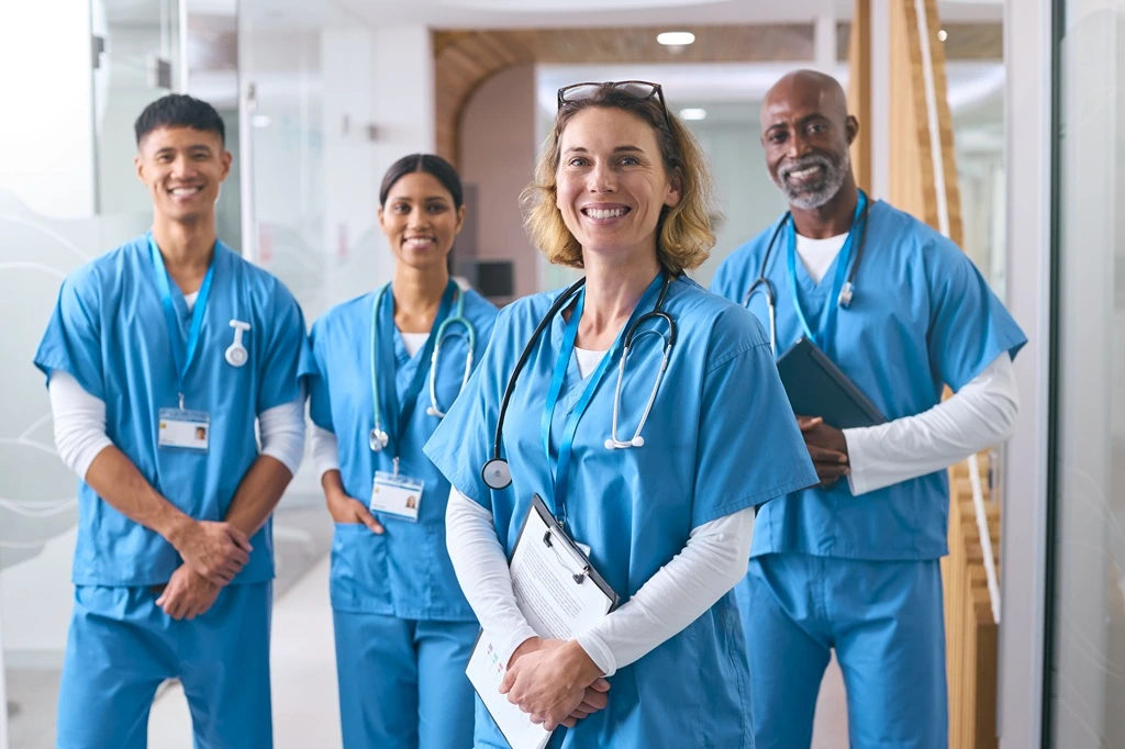 team of healthcare professionals highlighting teamwork and leadership as core competencies on resume