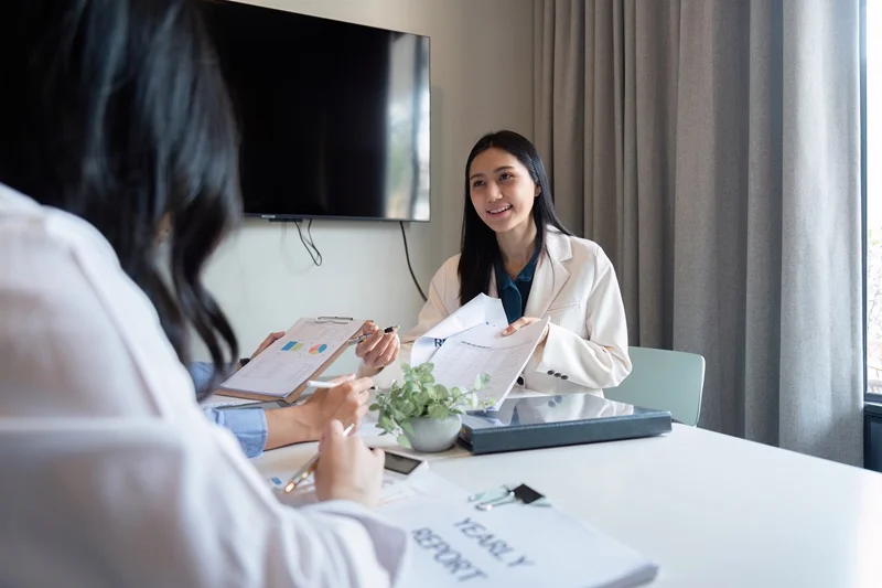 colleagues in healthcare conducting a mock interview to help a friend refine answers and boost confidence