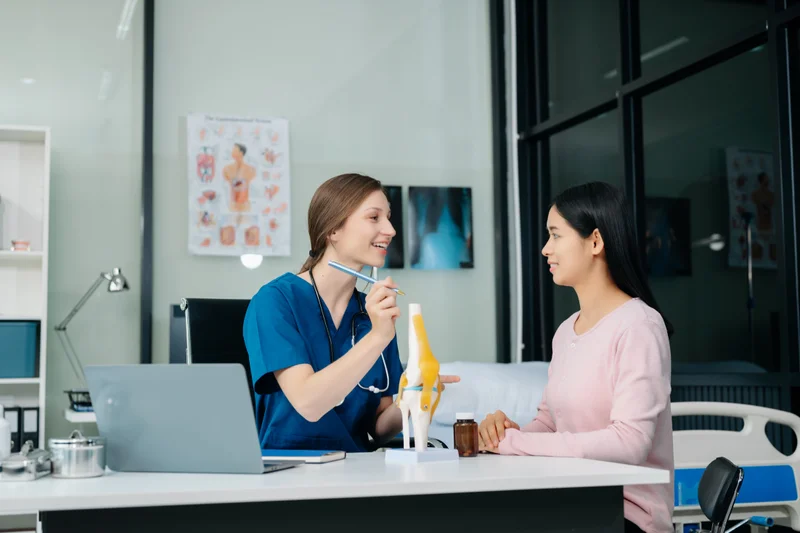 healthcare professional demonstrating adaptability skills on resume through patient interaction