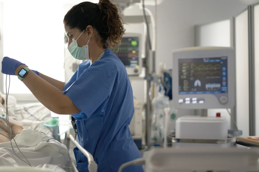 ICU Nurse preparing medical equipment