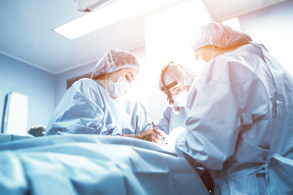 a team of healthcare staff fighting for the life of patient