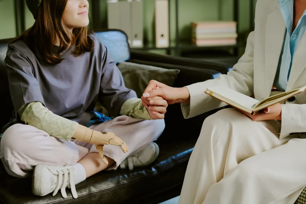 holding hands during compassionate counseling session