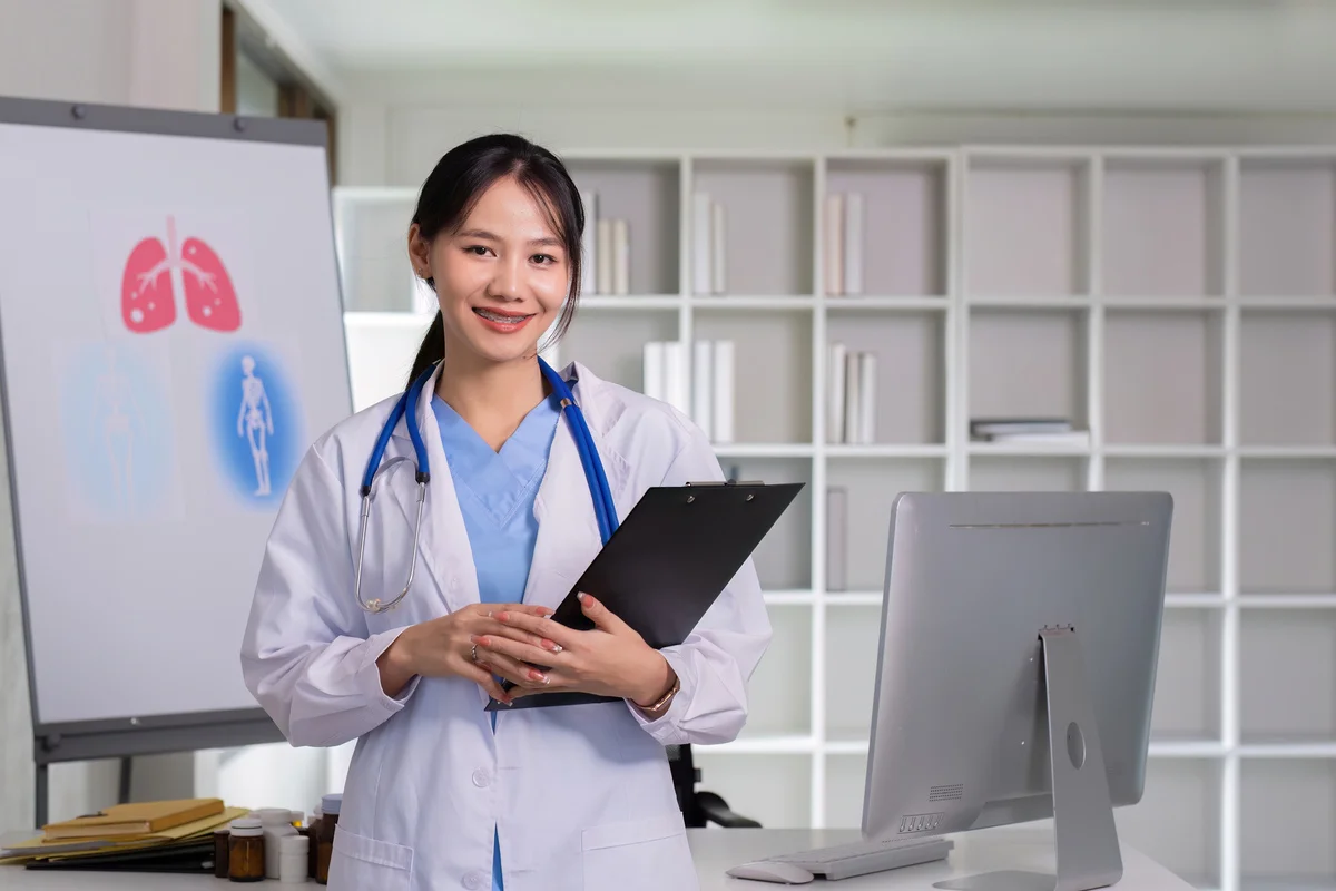 female doctor standing and checking lung care