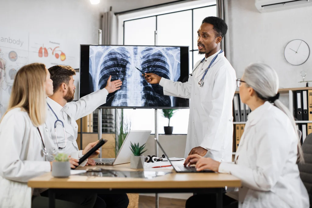 multiracial doctors having meeting about patient