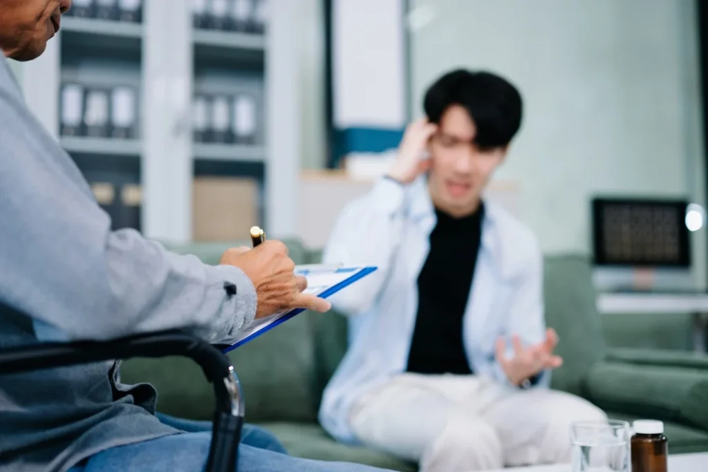man seeking expert help from professional psychiatrist